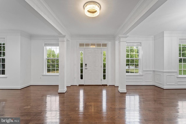 entrance foyer featuring crown molding and dark hardwood / wood-style floors