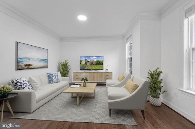 living room with dark hardwood / wood-style floors and ornamental molding