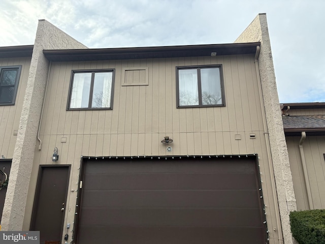 view of home's exterior with a garage