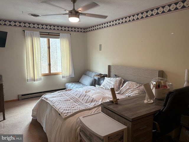 carpeted bedroom featuring ceiling fan and baseboard heating