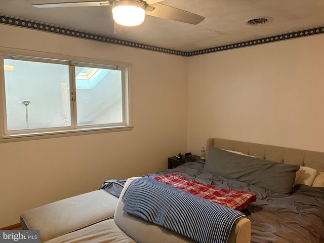 bedroom featuring ceiling fan