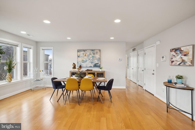 dining room featuring light hardwood / wood-style floors