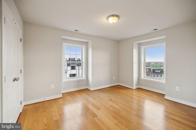 interior space featuring light hardwood / wood-style flooring and plenty of natural light