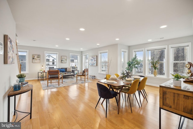 dining space featuring light hardwood / wood-style flooring