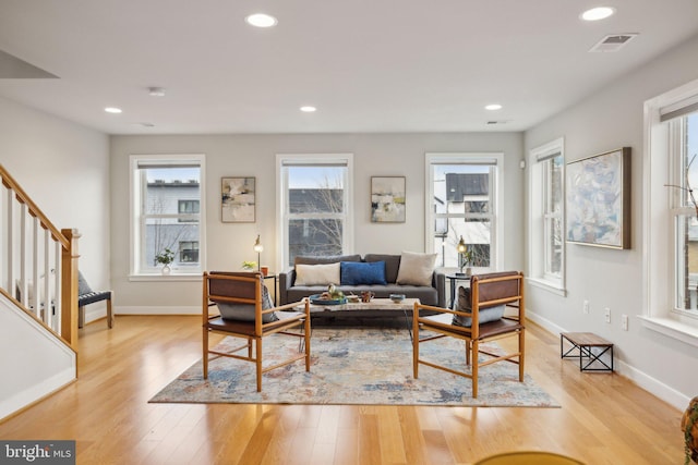 living room with light hardwood / wood-style floors