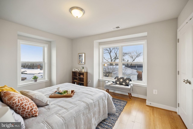 bedroom featuring light hardwood / wood-style floors