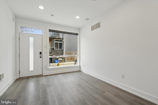 foyer with light hardwood / wood-style floors