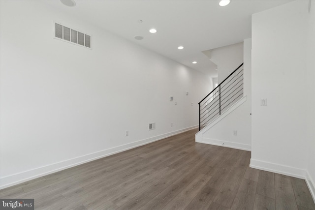 unfurnished living room with hardwood / wood-style floors