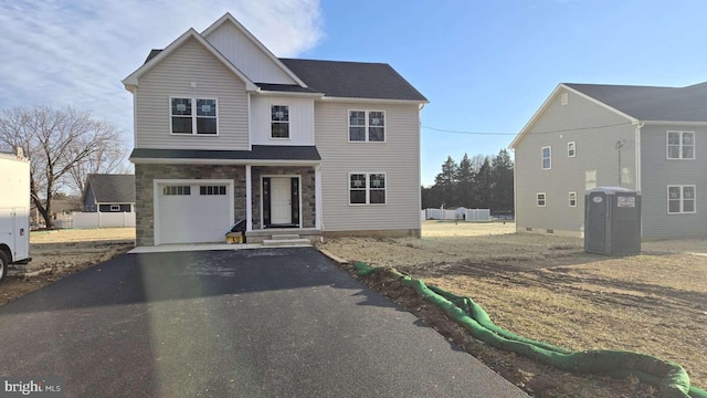 front facade with a garage