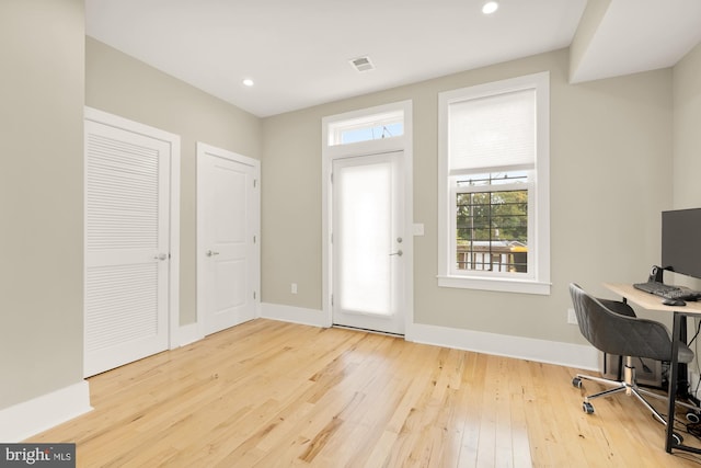 office area with light wood-type flooring