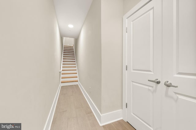 hall with light wood-type flooring