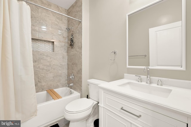 full bathroom featuring vanity, shower / bath combo, and toilet