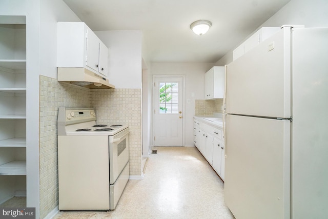 kitchen featuring white cabinets, white appliances, and backsplash