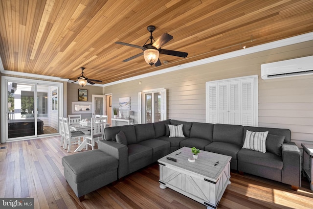 living room featuring ceiling fan, wooden ceiling, a wall mounted AC, wooden walls, and hardwood / wood-style flooring