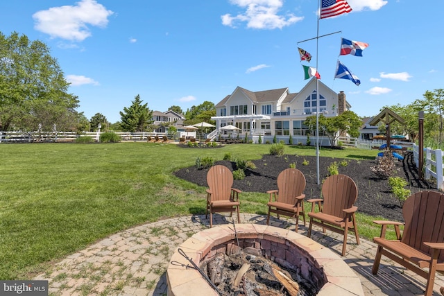 view of patio featuring a fire pit