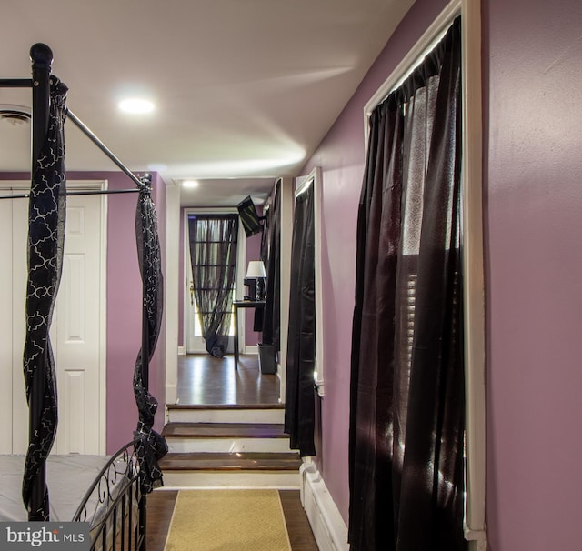 walk in closet featuring hardwood / wood-style flooring