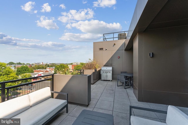 view of patio / terrace featuring an outdoor hangout area, a balcony, and area for grilling