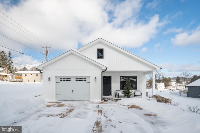 modern farmhouse featuring a garage