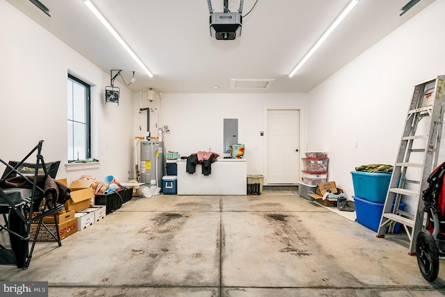 garage with electric panel, a garage door opener, and water heater