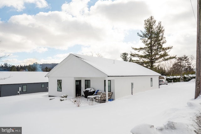 view of snow covered house