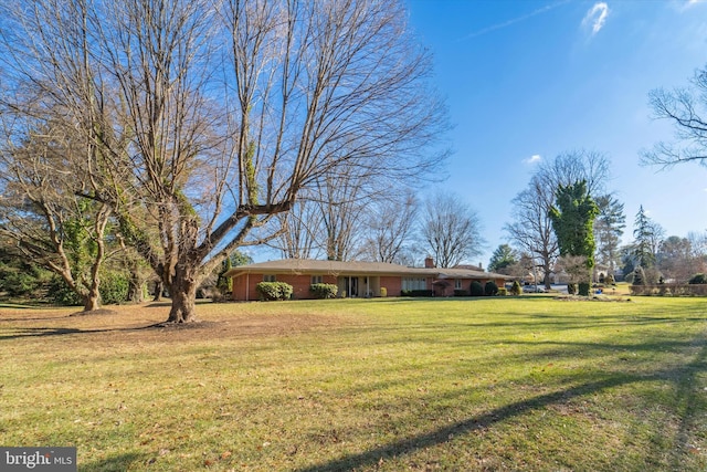 exterior space with a front lawn