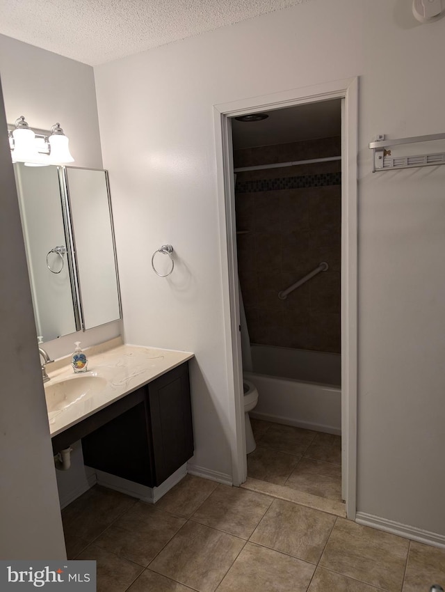 full bathroom with shower / bathing tub combination, a textured ceiling, toilet, and sink