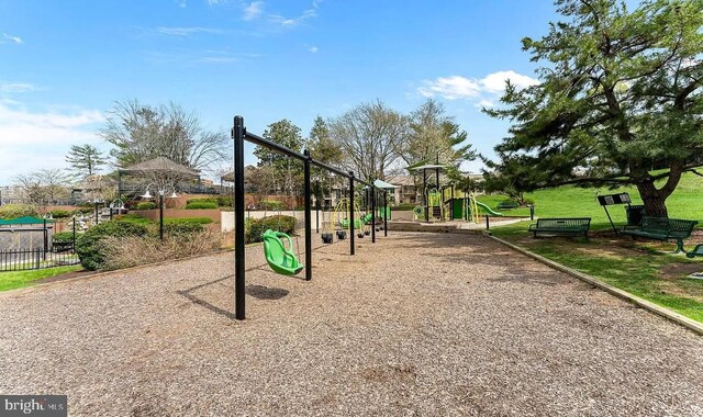 view of play area featuring a lawn