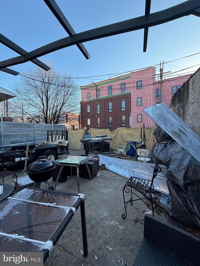 view of patio / terrace with glass enclosure