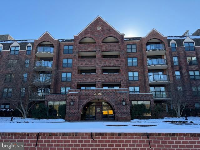 view of snow covered property