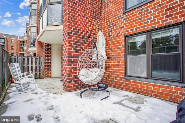 view of snow covered patio