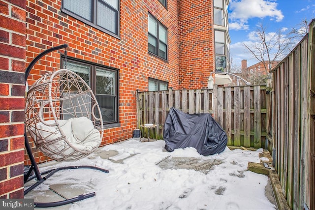 view of snow covered patio