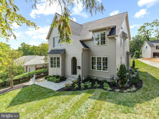 view of front of property with a front lawn