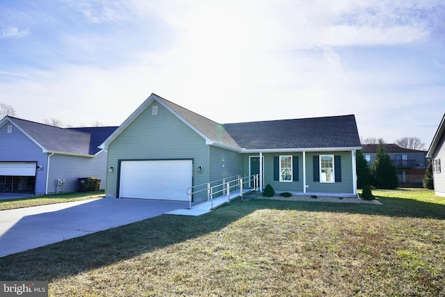 ranch-style house featuring a garage and a front lawn