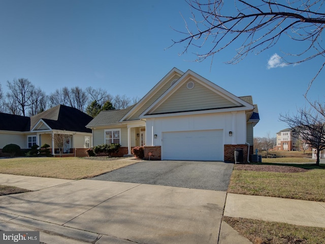 ranch-style house with central AC, a garage, and a front lawn