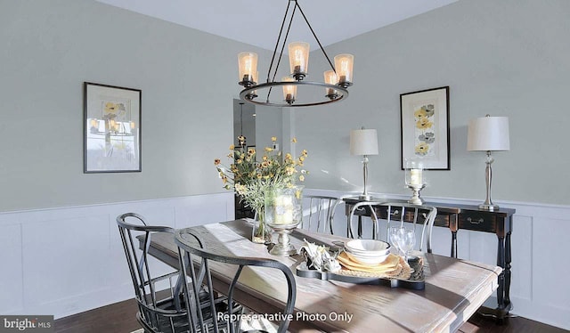 120 Forge Dr, Lebanon, PA 17042 - dining space with dark hardwood / wood-style floors, lofted ceiling, and an inviting chandelier