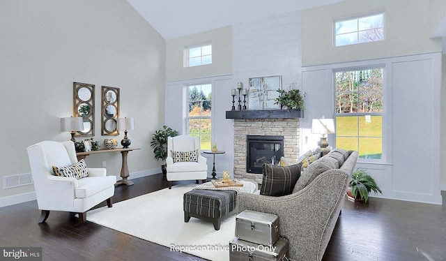 120 Forge Dr, Lebanon, PA 17042 - living room featuring a fireplace, a high ceiling, and a healthy amount of sunlight