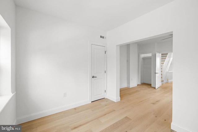 spare room featuring light hardwood / wood-style flooring