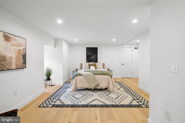 bedroom featuring wood-type flooring