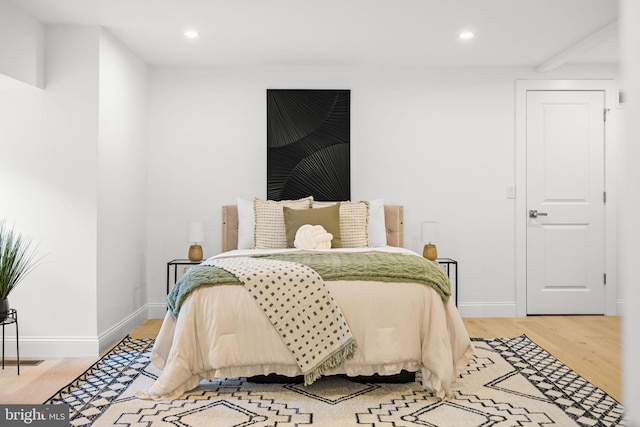 bedroom featuring hardwood / wood-style floors