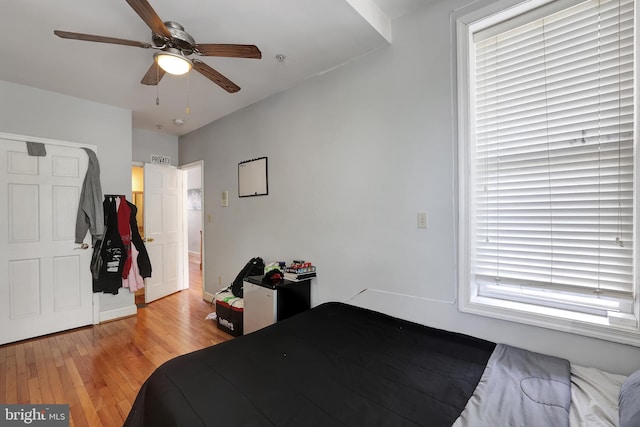 bedroom featuring ceiling fan and light hardwood / wood-style floors