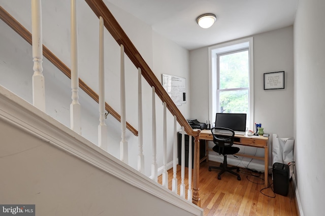 office space with hardwood / wood-style floors