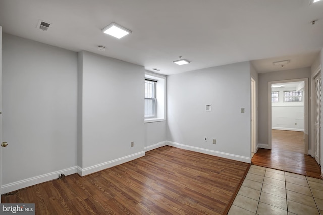 spare room featuring hardwood / wood-style flooring