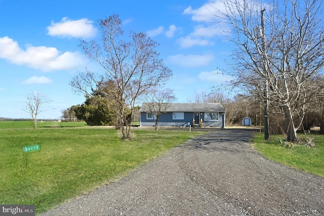 ranch-style house with a front yard