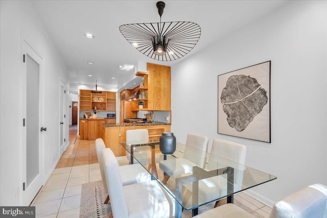 dining room featuring light tile patterned floors