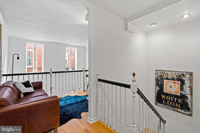 staircase featuring wood-type flooring