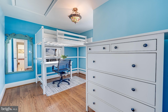 bedroom with light hardwood / wood-style floors