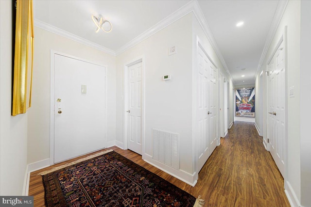 interior space featuring hardwood / wood-style floors and ornamental molding