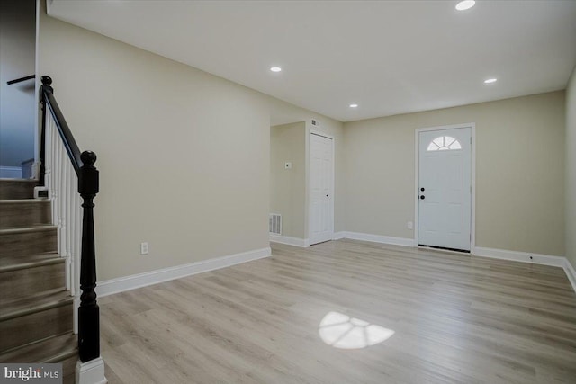 foyer entrance featuring light hardwood / wood-style flooring