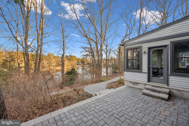 view of patio / terrace with a water view