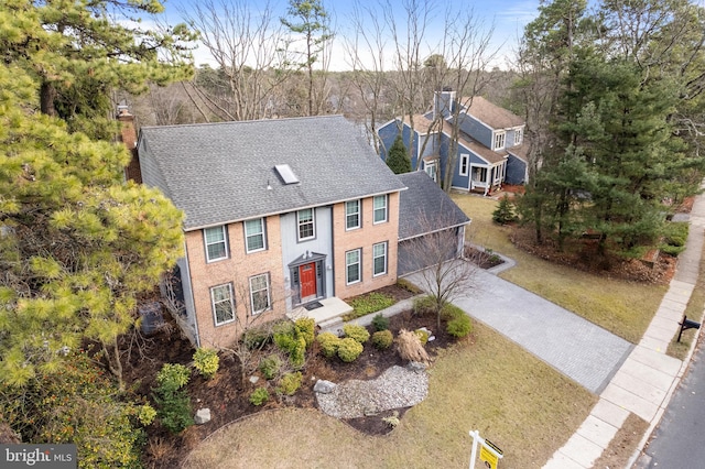 view of front of property with a front lawn